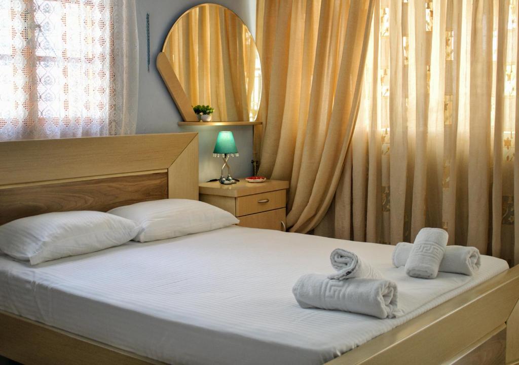 Postel nebo postele na pokoji v ubytování Studios and Apartments Meri