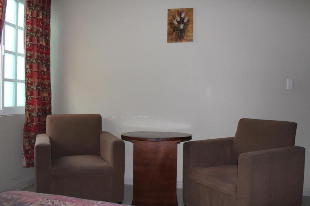 Posezení v ubytování Hotel Gina