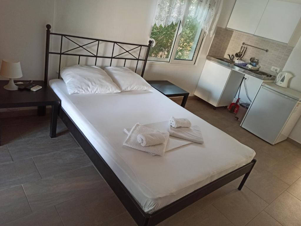 Postel nebo postele na pokoji v ubytování Apartment's Meti