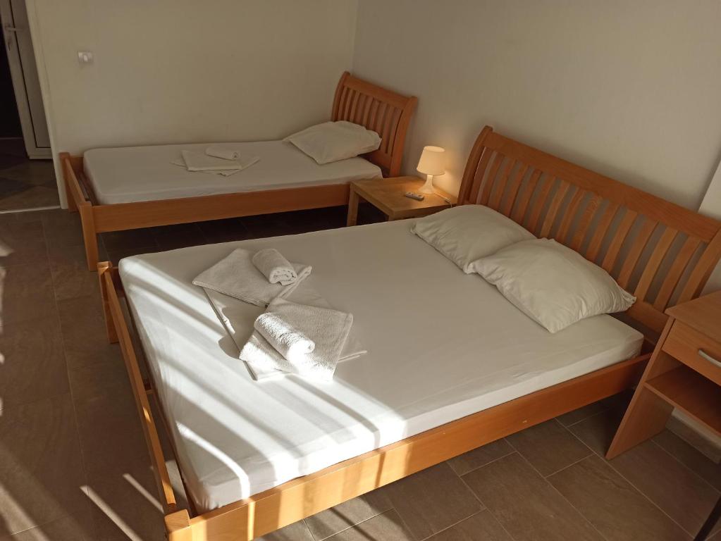 Postel nebo postele na pokoji v ubytování Apartment's Meti
