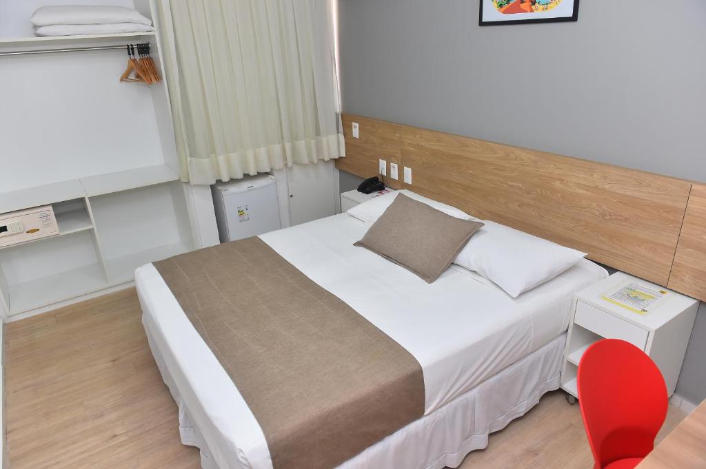 Postel nebo postele na pokoji v ubytování Hotel Três Caravelas