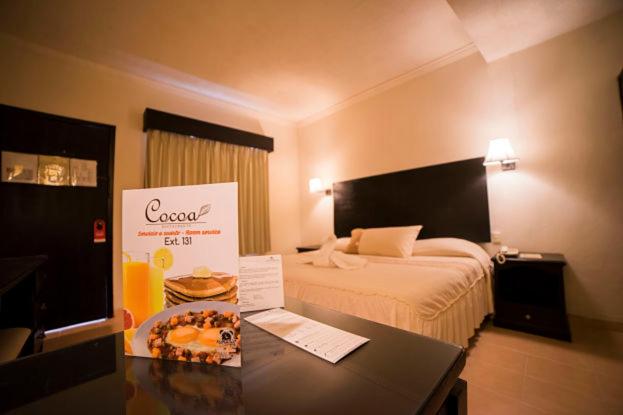Postel nebo postele na pokoji v ubytování Hotel Marlon