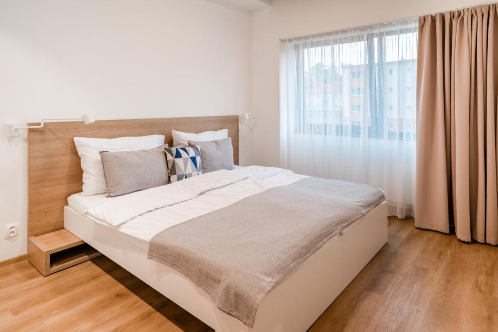 Letto o letti in una camera di ARMEX LiveCentrum