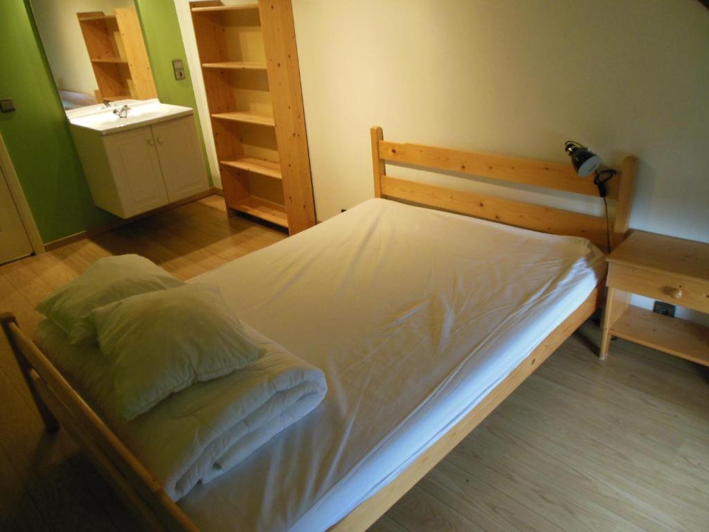 Postel nebo postele na pokoji v ubytování Hof Ten Beemd