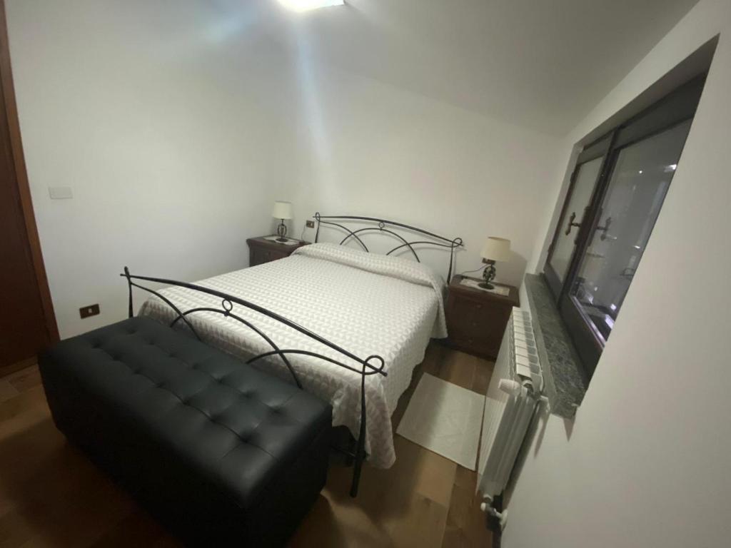 Postel nebo postele na pokoji v ubytování B&B Monteguzzo