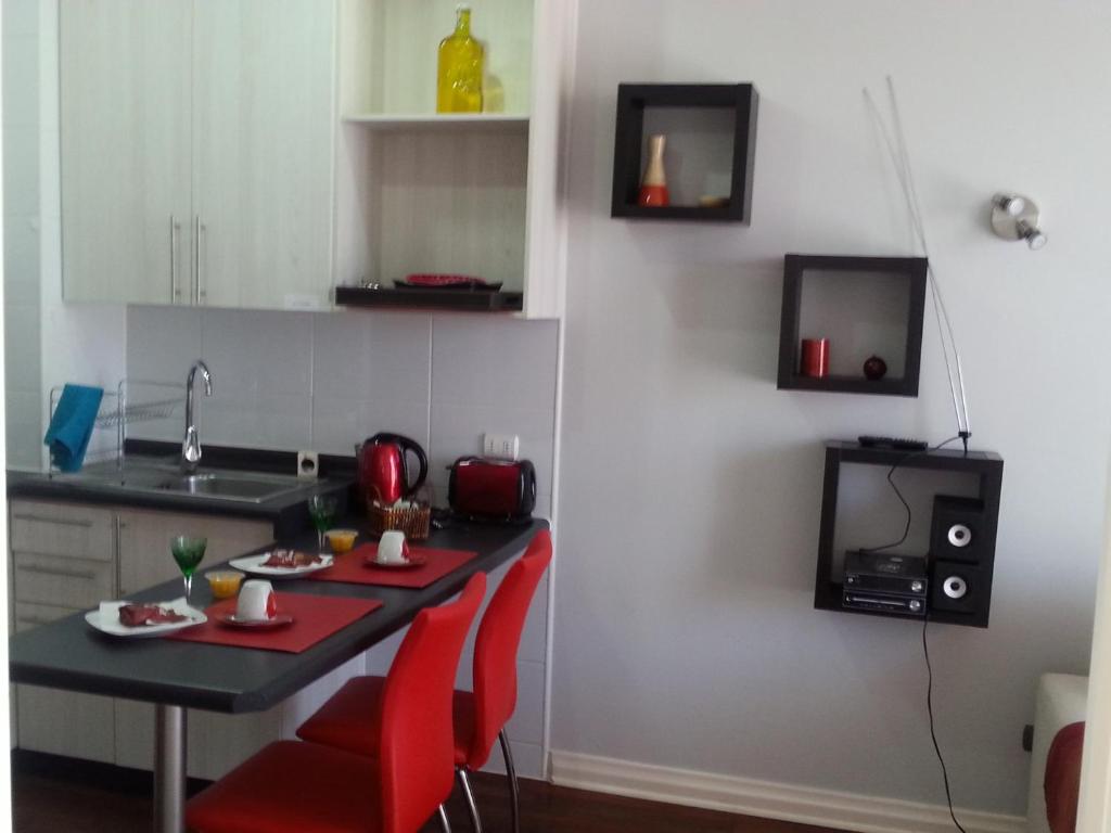 Kuchyň nebo kuchyňský kout v ubytování Apart las Rastras talca