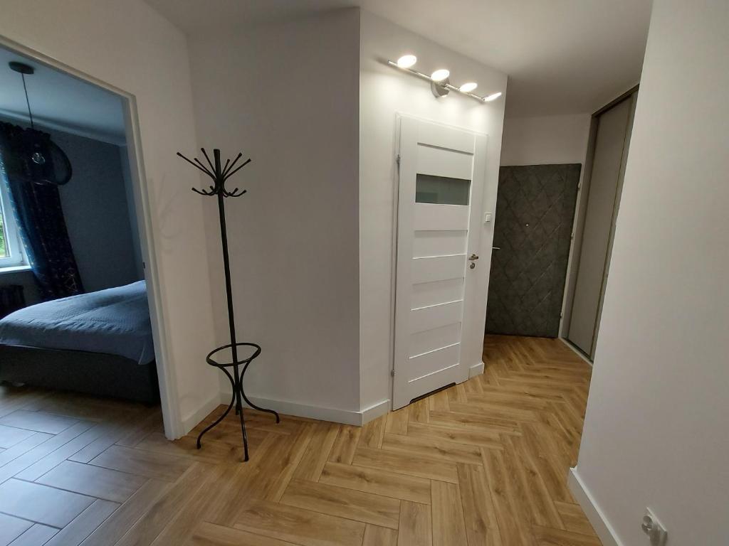 Postel nebo postele na pokoji v ubytování GS Apartament Olsztyn