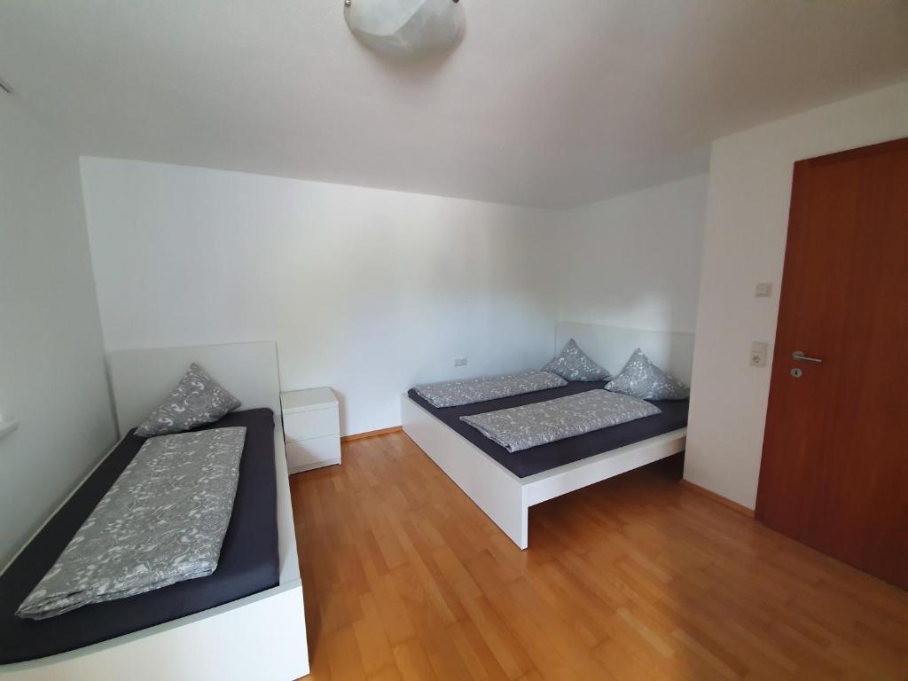 Postel nebo postele na pokoji v ubytování Ferienwohnung Anjele