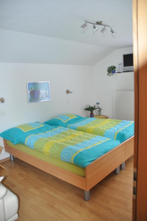 Postel nebo postele na pokoji v ubytování Apartmenthaus Holiday