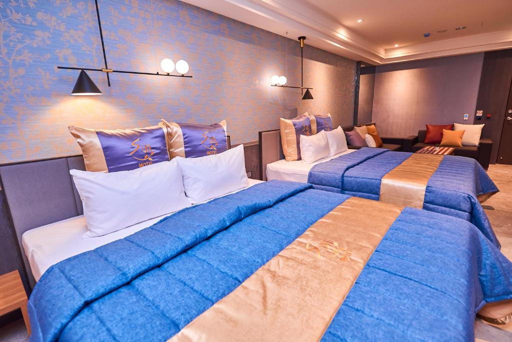 Postel nebo postele na pokoji v ubytování Sun Motel