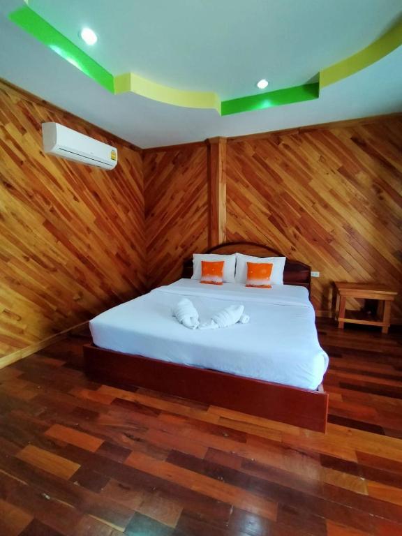Postel nebo postele na pokoji v ubytování Palmsuay Resort