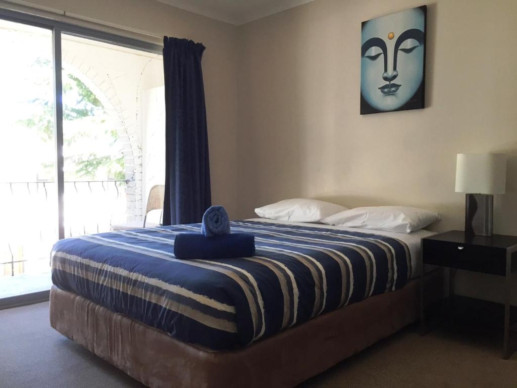 Postel nebo postele na pokoji v ubytování Siesta Villa