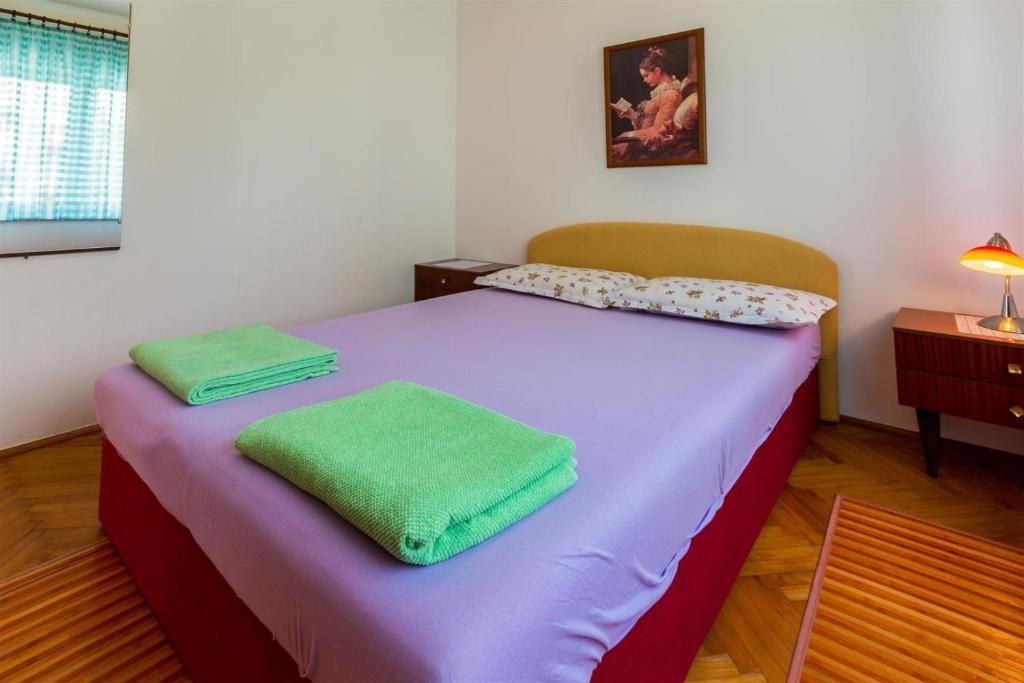 Postel nebo postele na pokoji v ubytování Two-Bedroom Apartment in Crikvenica XVI
