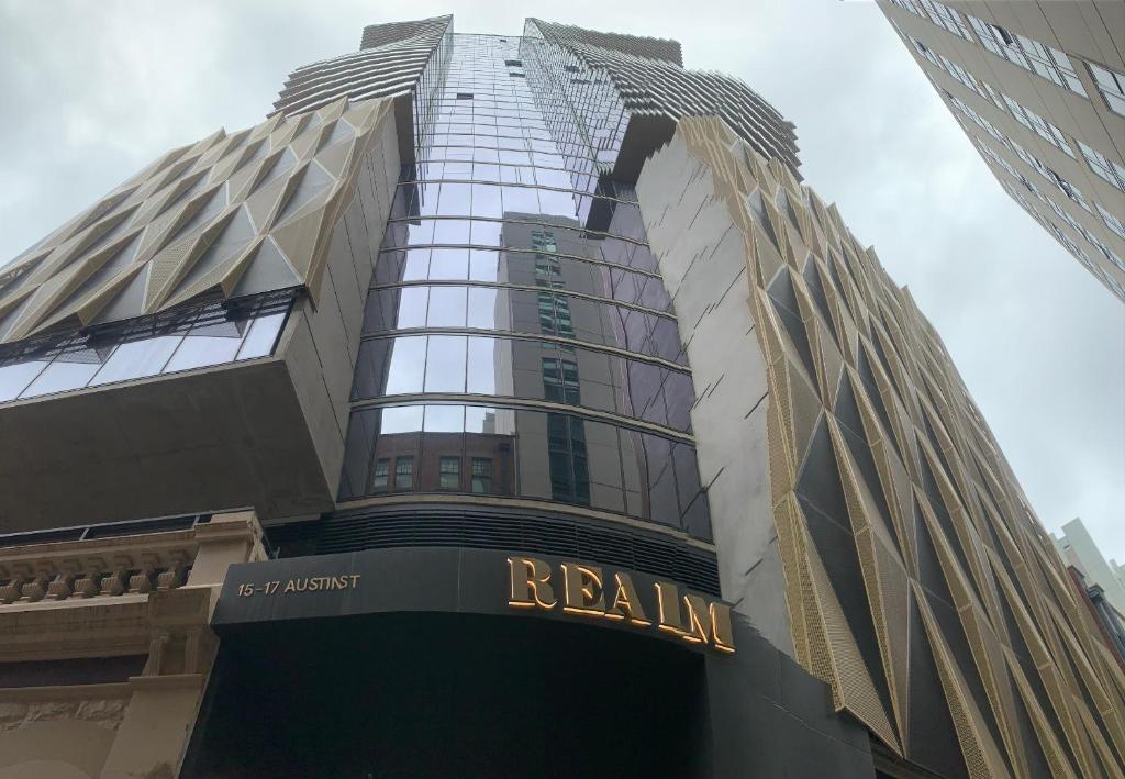 a tall building with the name relain on it at RNR Rundle Mall in Adelaide