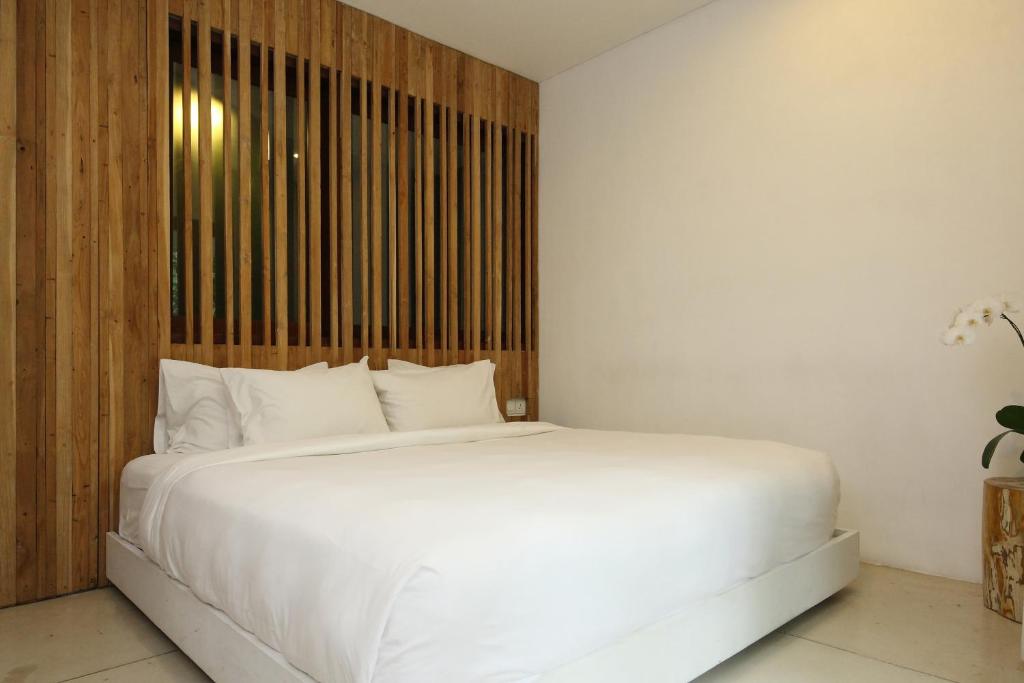 Postel nebo postele na pokoji v ubytování Aria Villas Ubud