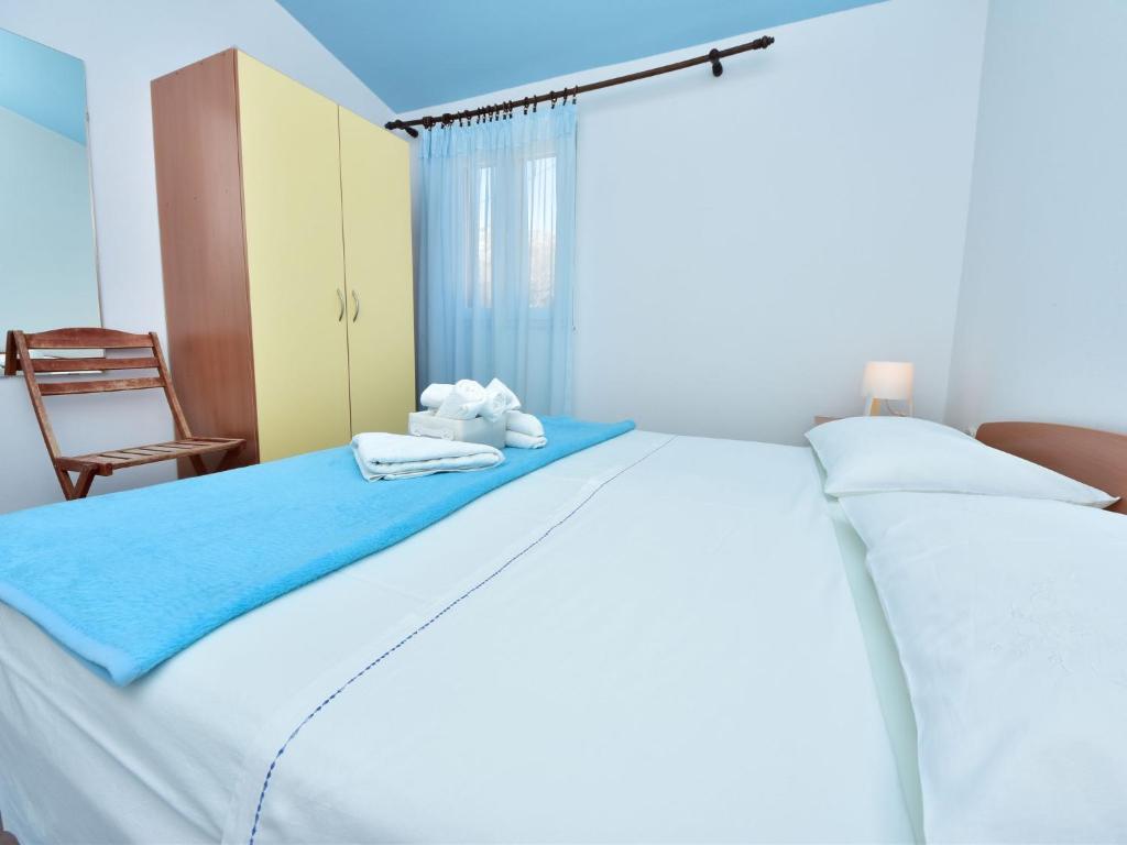 Postel nebo postele na pokoji v ubytování Apartment Vukić-3 by Interhome