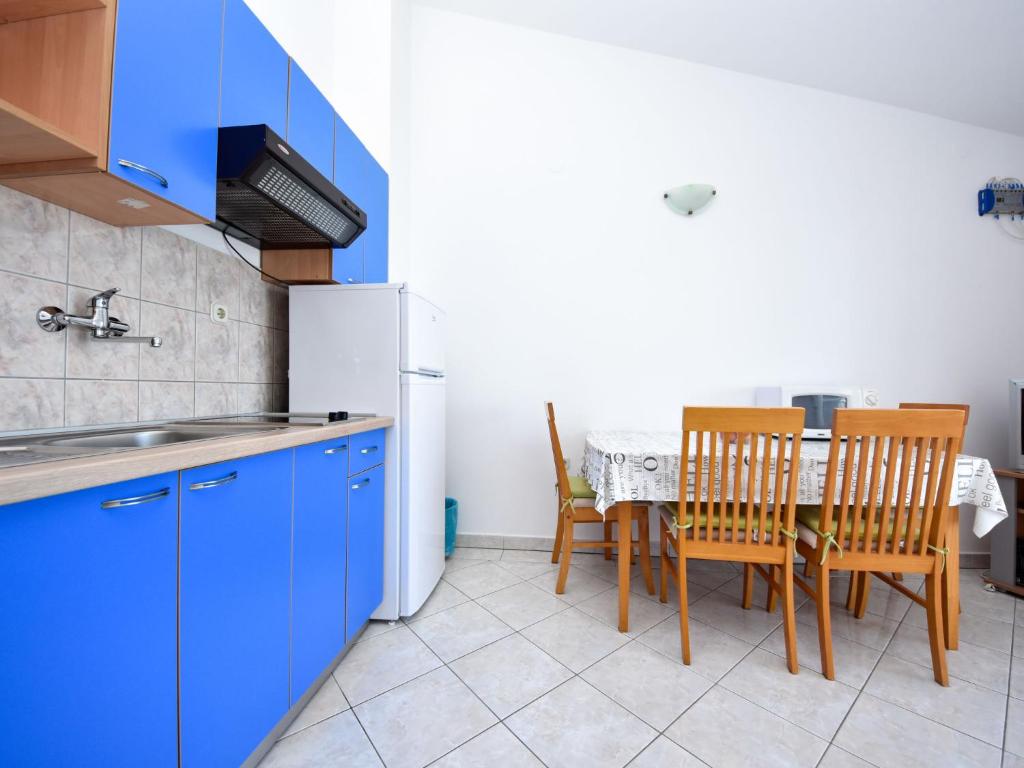 Kuchyň nebo kuchyňský kout v ubytování Apartment Vukić-3 by Interhome