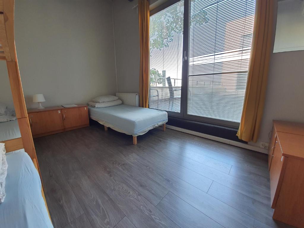 Postel nebo postele na pokoji v ubytování Sea Hostel