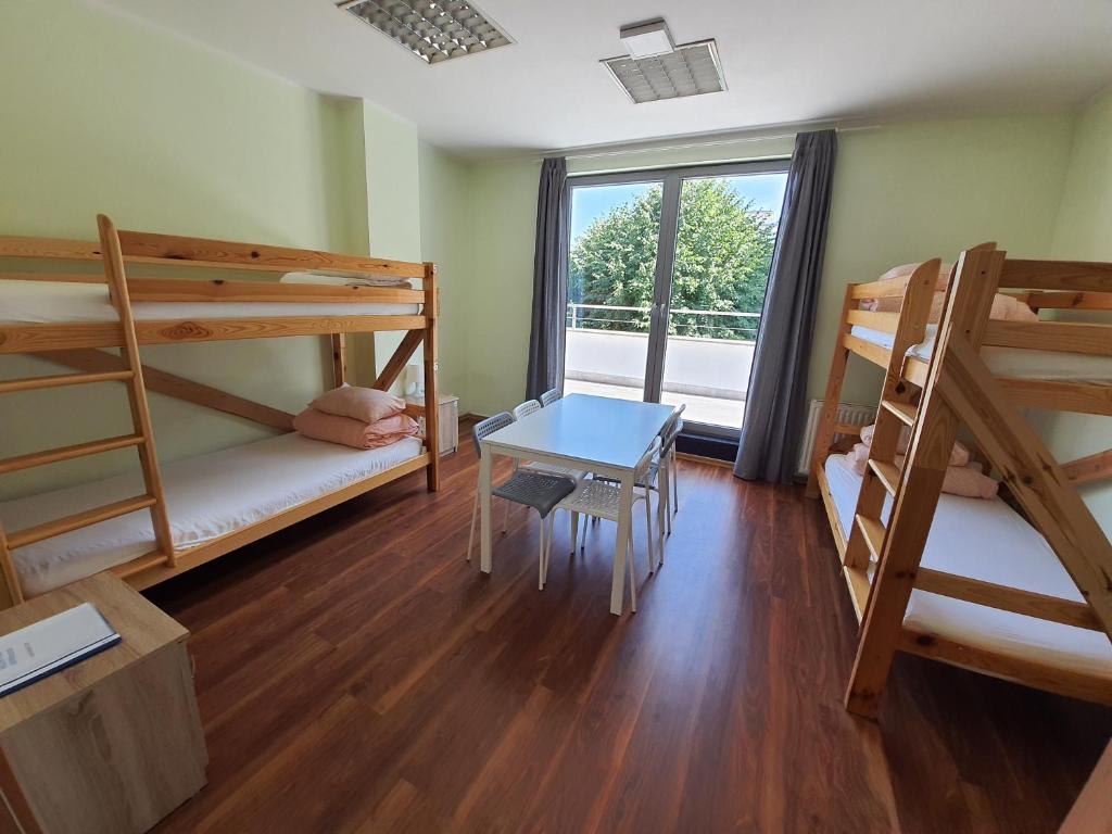 Postel nebo postele na pokoji v ubytování Sea Hostel