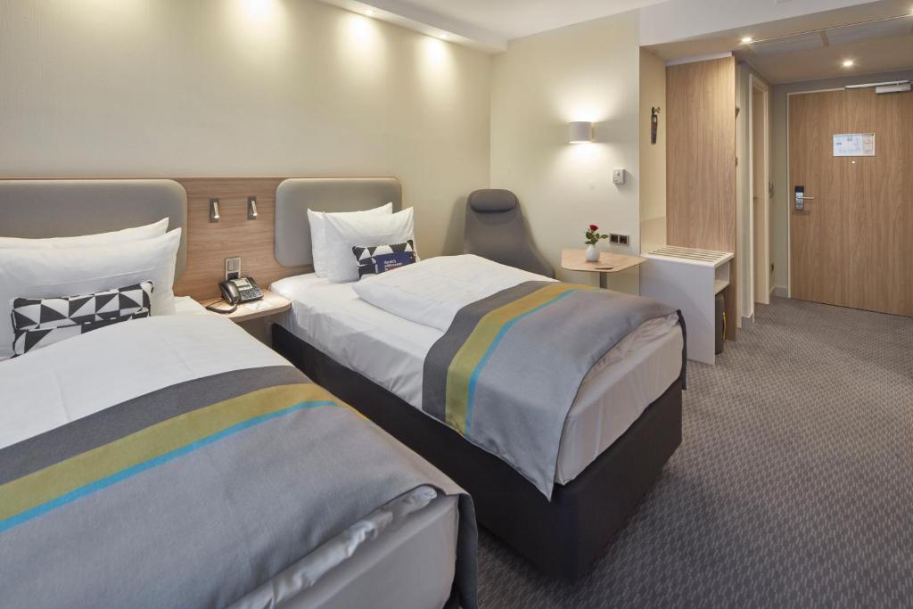 Postel nebo postele na pokoji v ubytování Holiday Inn Express - Merzig by IHG