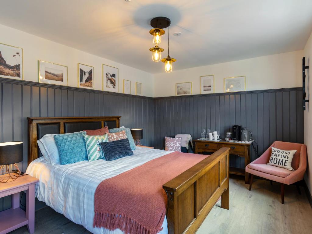 Postel nebo postele na pokoji v ubytování Macs Townhouse Dungarvan