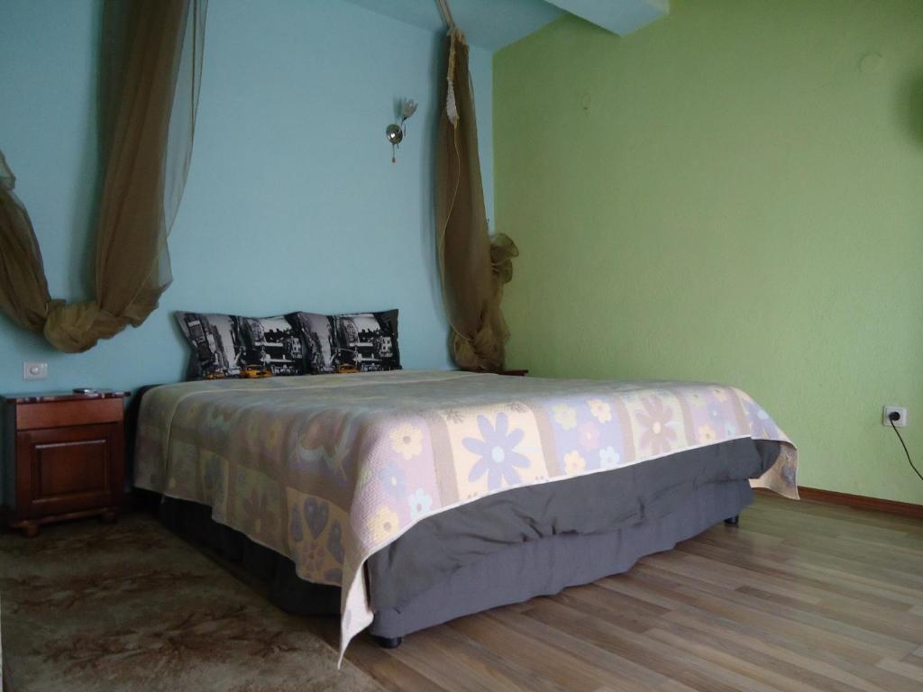 Postel nebo postele na pokoji v ubytování Dionis Hotel