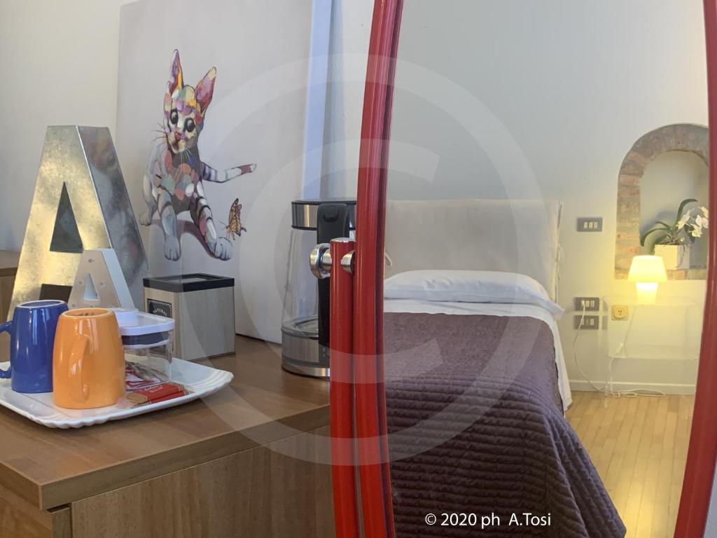 Postel nebo postele na pokoji v ubytování A.A.A. Armonie B&B