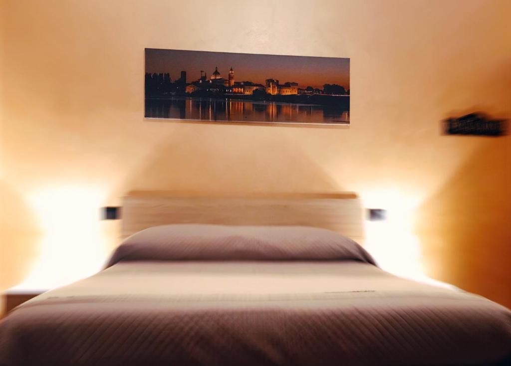 Postel nebo postele na pokoji v ubytování casa TRE19