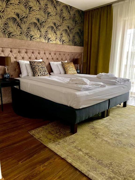 Postel nebo postele na pokoji v ubytování Bali Butique Rooms