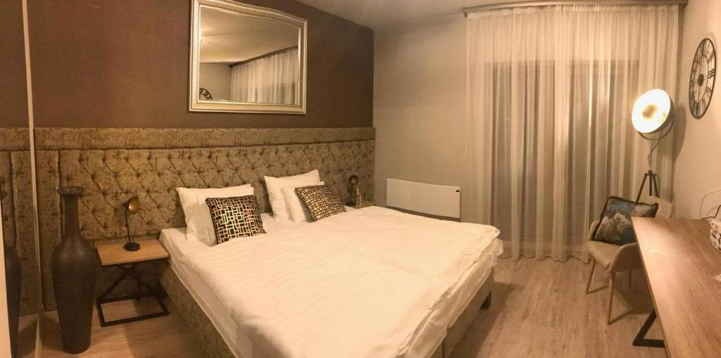 Postel nebo postele na pokoji v ubytování Bali Butique Rooms