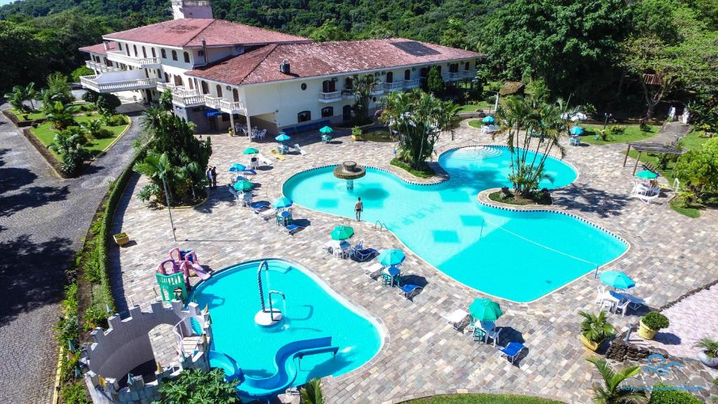 an aerial view of a swimming pool at a resort at Mata Atlântica Park Hotel in Matinhos
