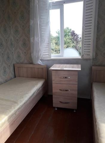 Postel nebo postele na pokoji v ubytování liziko's House