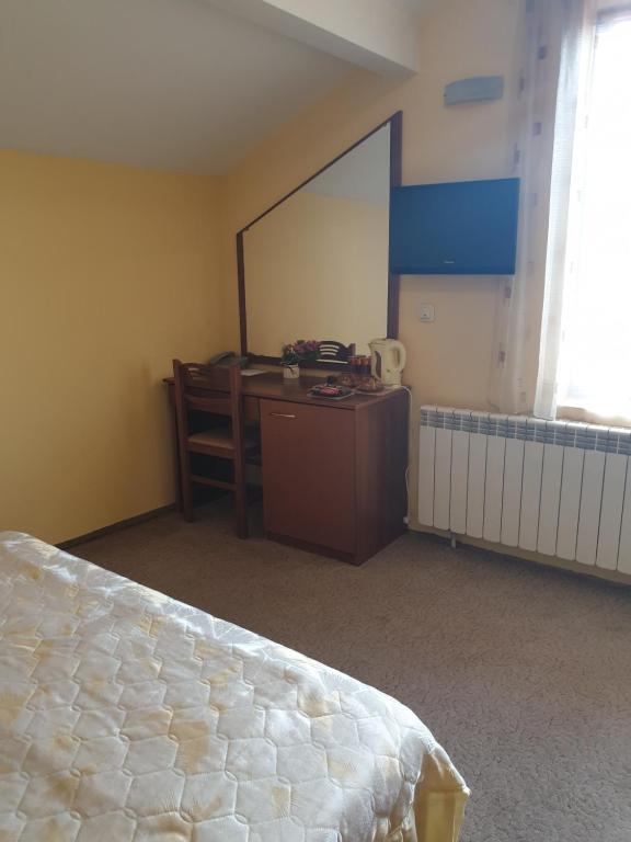 TV a/nebo společenská místnost v ubytování Guesthouse Kiritsovi