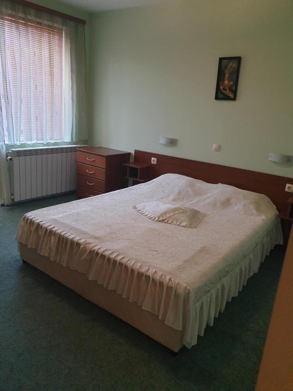 Postel nebo postele na pokoji v ubytování Guesthouse Kiritsovi