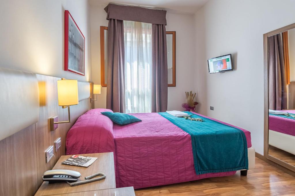Posteľ alebo postele v izbe v ubytovaní Hotel Il Moro di Venezia