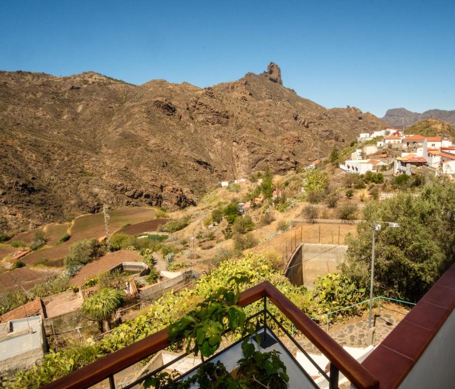 a view of a mountain from a balcony at HOUSES RENTAL The BEST VIEWS in Tejeda