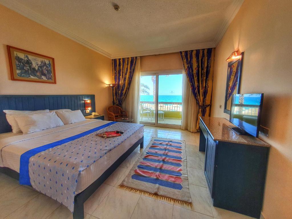 Postel nebo postele na pokoji v ubytování Palm Beach Resort Families and Couples only