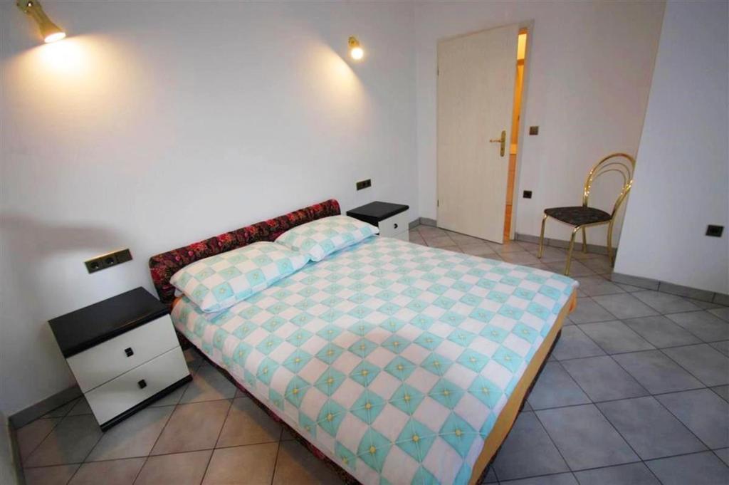 Posteľ alebo postele v izbe v ubytovaní Apartments in Rabac 39139