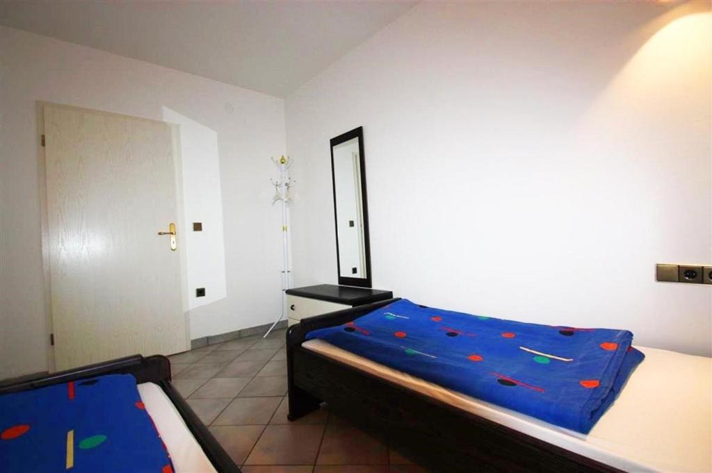 Posteľ alebo postele v izbe v ubytovaní Apartments in Rabac 39139