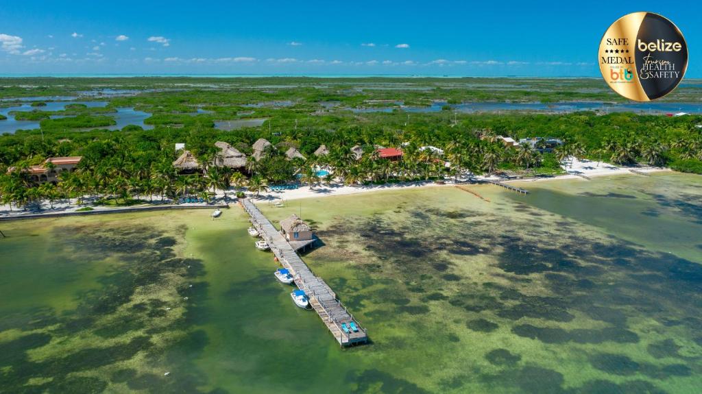 an aerial view of a resort on a tropical island at Portofino Beach Resort-An Authentic Island Escape! in San Pedro