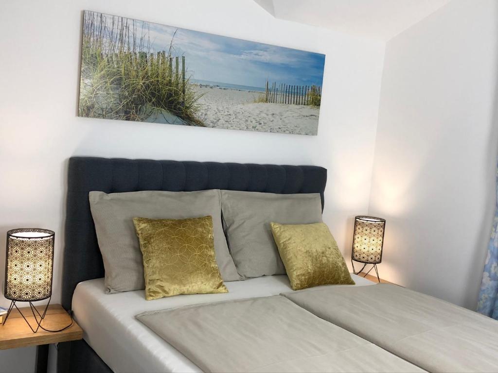 Łóżko lub łóżka w pokoju w obiekcie Apartments Villa Učka
