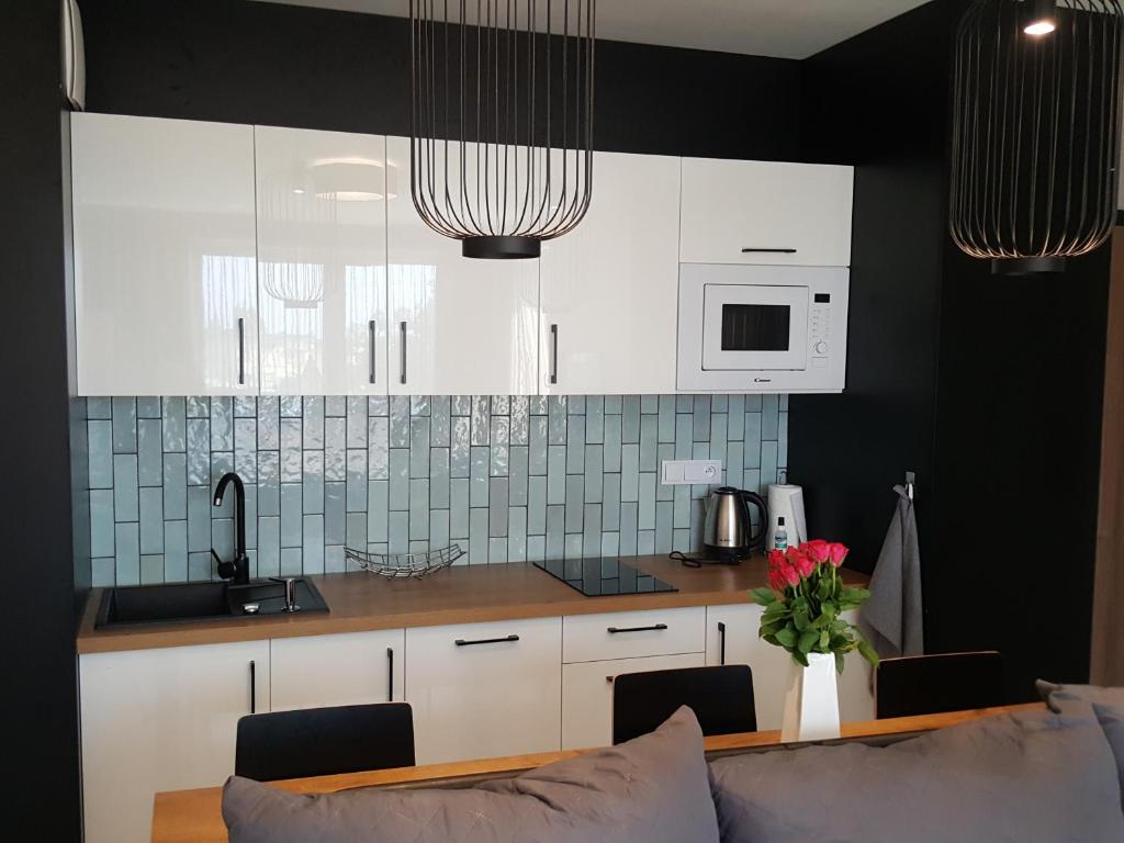 Kuchyňa alebo kuchynka v ubytovaní Apartament Bel Mare D 411