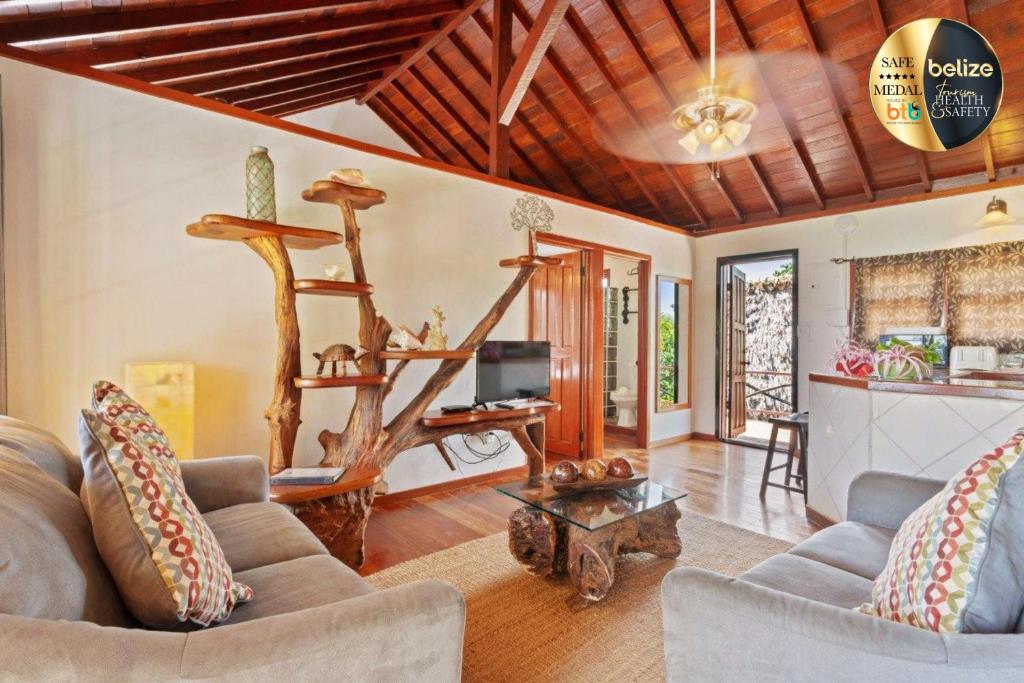 a living room with a couch and a table at Portofino Beach Resort-An Authentic Island Escape! in San Pedro