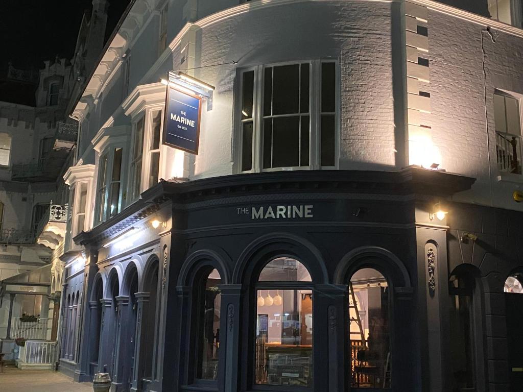 a building with a clock on the front of it at The Marine in Ryde