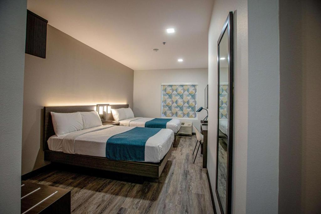 Postel nebo postele na pokoji v ubytování Motel 6 North Platte - East