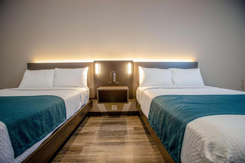 Postel nebo postele na pokoji v ubytování Motel 6 North Platte - East