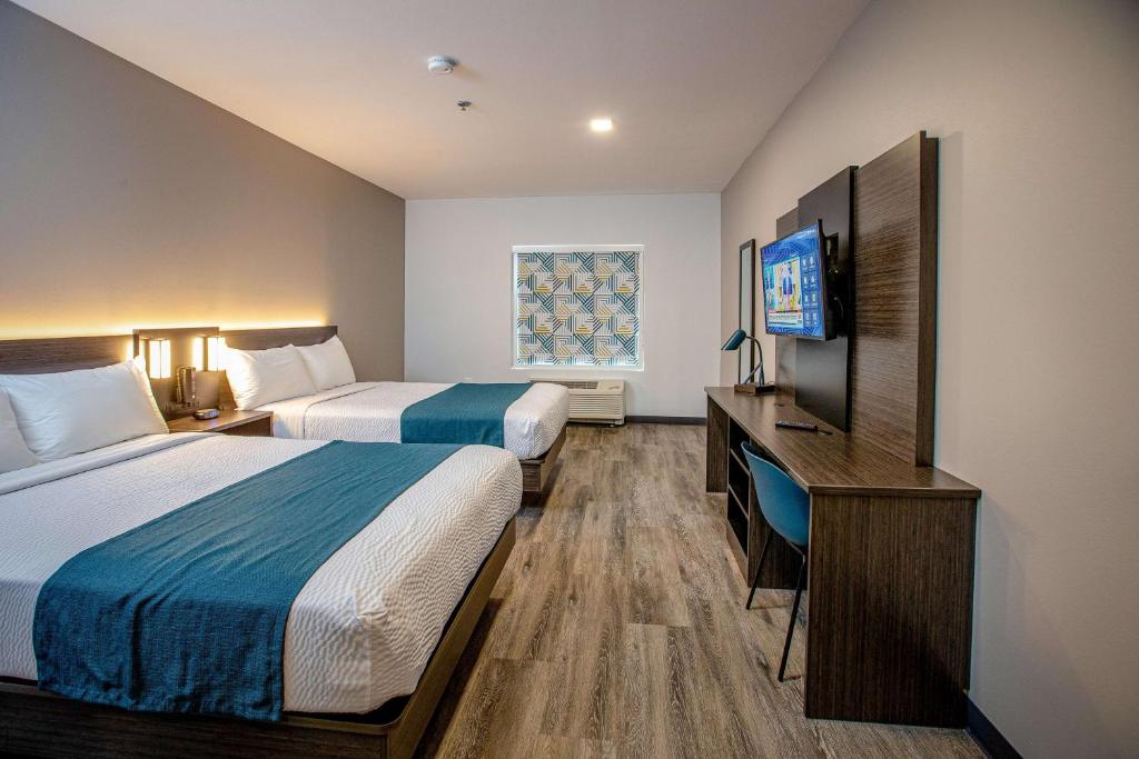 Postel nebo postele na pokoji v ubytování Motel 6 North Platte - East