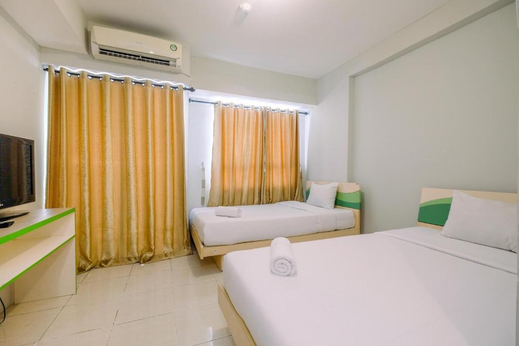 Modern Studio Apartment at Taman Melati Margonda near Universitas Indonesia By Travelio - Apartamento De Estudio