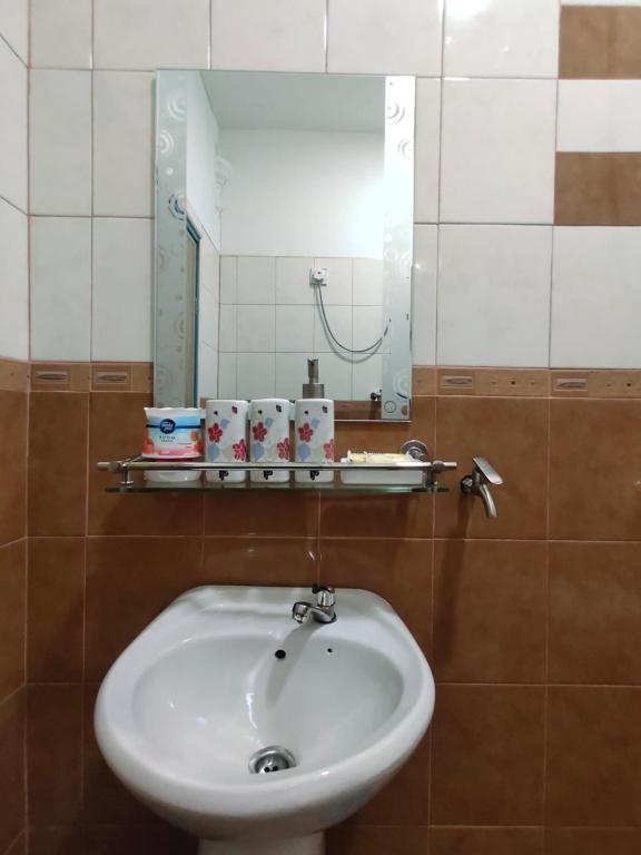 Koupelna v ubytování Ku's Roomstay