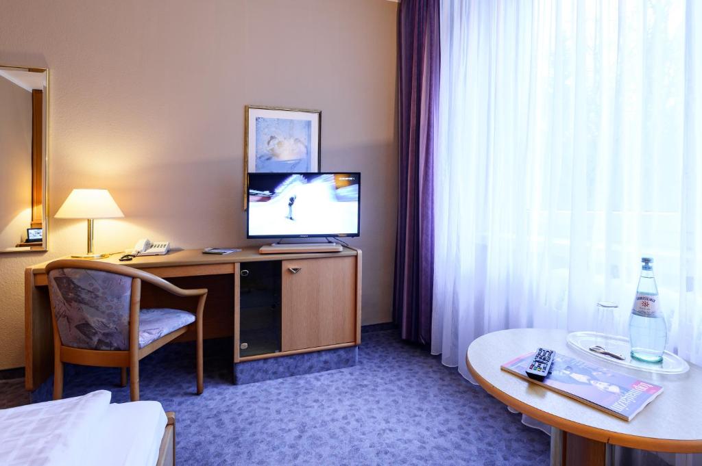 TV a/nebo společenská místnost v ubytování Waldhotel Berghof